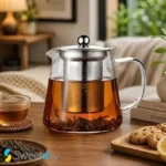 قوری پیرکس گرد شیشه‌ای با درب و صافی استیل
